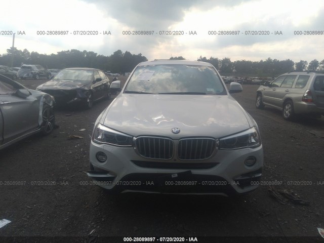 Photo 5 VIN: 5UXXW3C35H0T79897 - BMW X4 