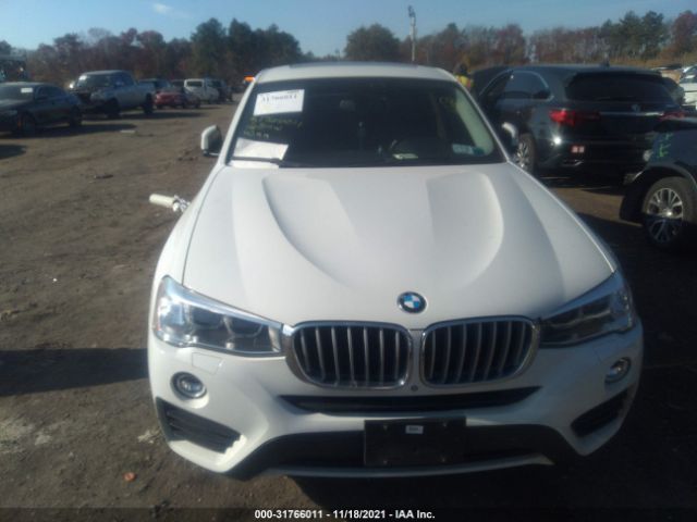 Photo 5 VIN: 5UXXW3C50G0R19544 - BMW X4 