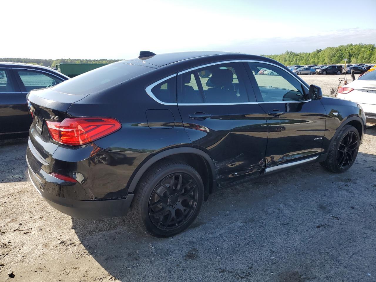 Photo 2 VIN: 5UXXW3C50J0T80706 - BMW X4 