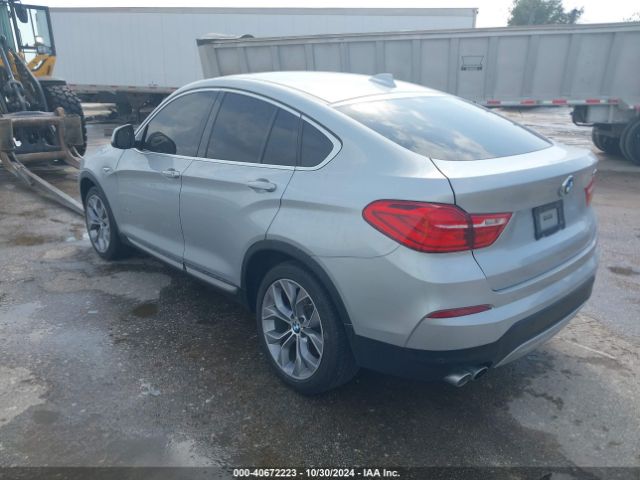 Photo 2 VIN: 5UXXW3C50J0T82875 - BMW X4 