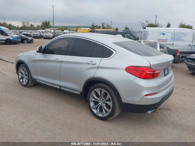 Photo 2 VIN: 5UXXW3C50J0T82875 - BMW X4 