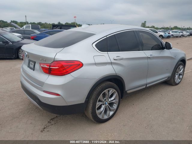 Photo 3 VIN: 5UXXW3C50J0T82875 - BMW X4 