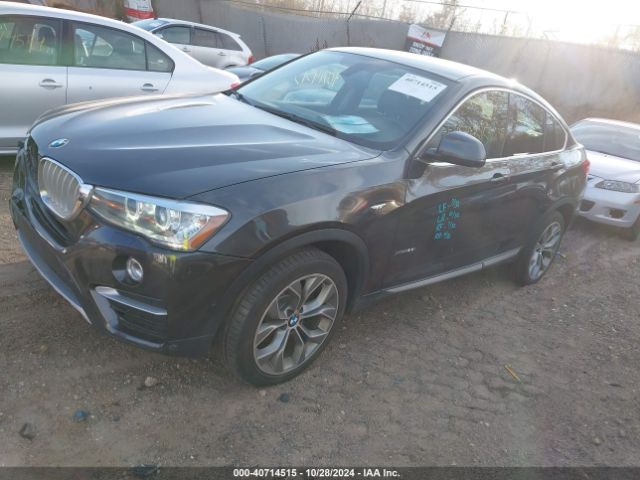 Photo 1 VIN: 5UXXW3C51F0M87142 - BMW X4 