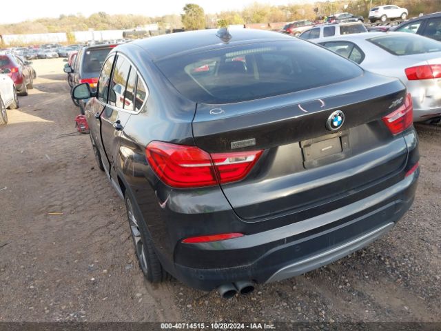 Photo 2 VIN: 5UXXW3C51F0M87142 - BMW X4 