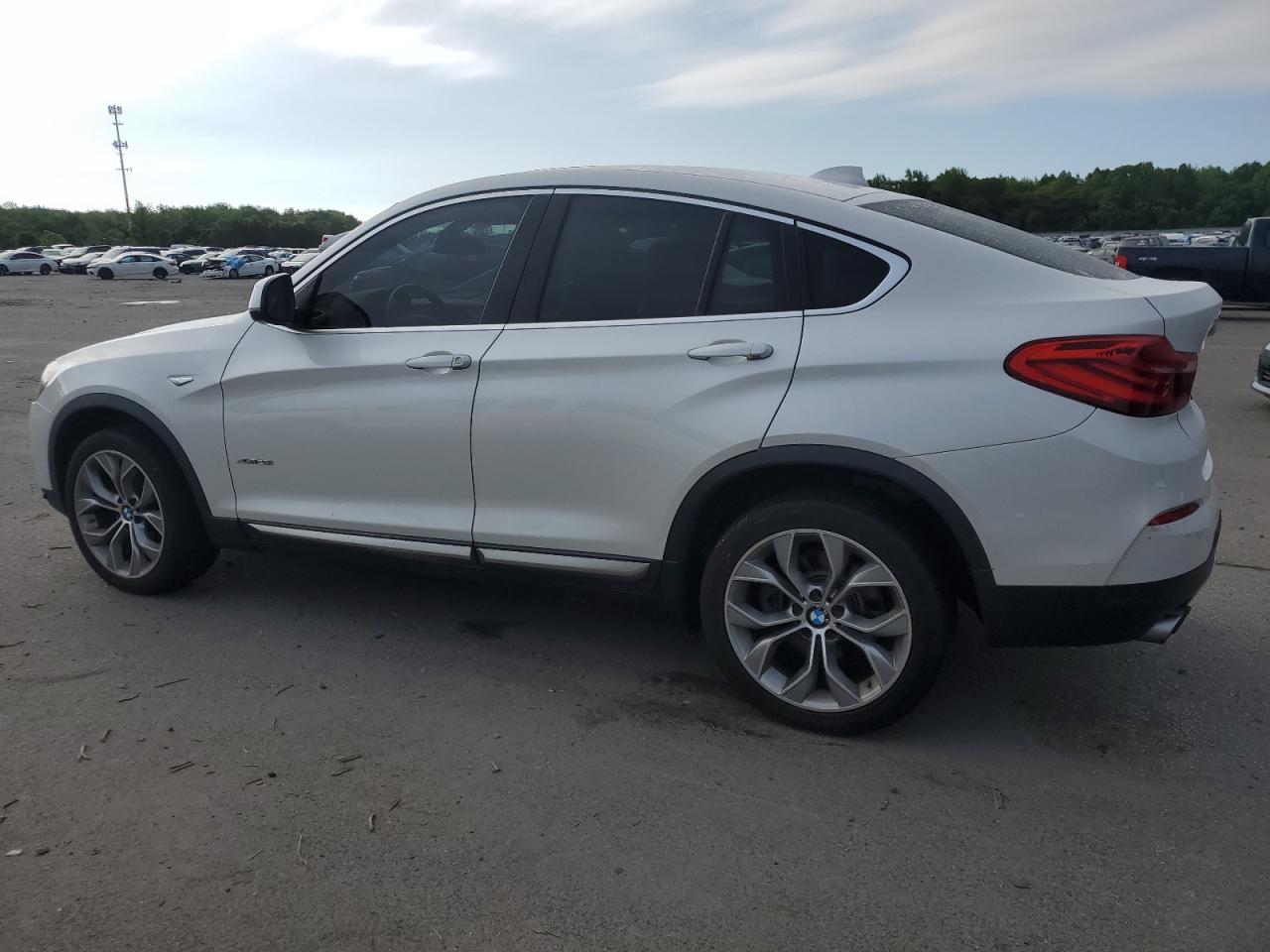 Photo 1 VIN: 5UXXW3C51G0R21707 - BMW X4 