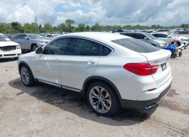 Photo 2 VIN: 5UXXW3C52F0F89519 - BMW X4 