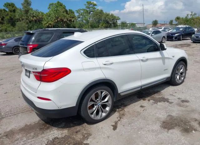 Photo 3 VIN: 5UXXW3C52F0F89519 - BMW X4 