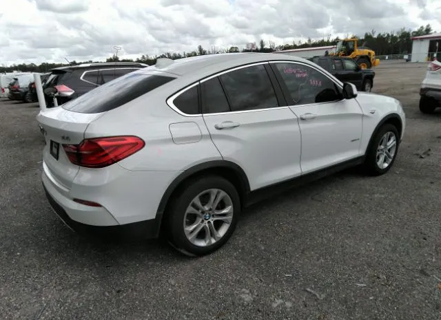 Photo 3 VIN: 5UXXW3C53F0M88261 - BMW X4 