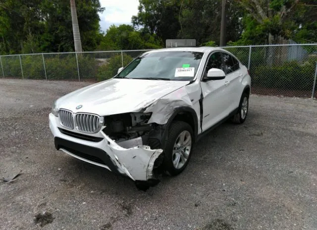 Photo 5 VIN: 5UXXW3C53F0M88261 - BMW X4 