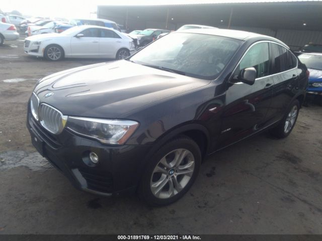 Photo 1 VIN: 5UXXW3C53F0M88387 - BMW X4 