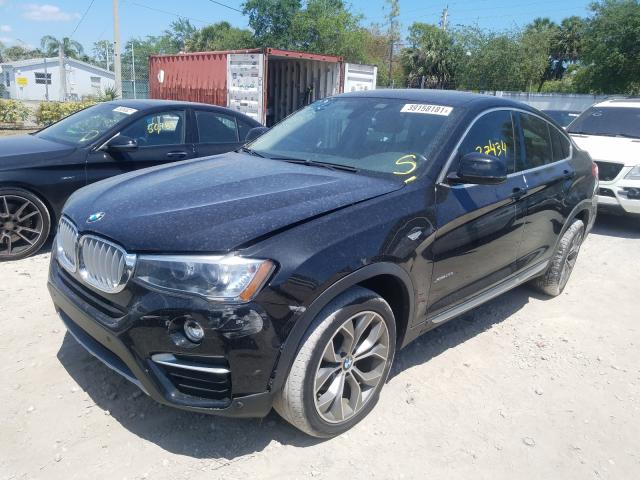 Photo 1 VIN: 5UXXW3C53G0M89749 - BMW X4 