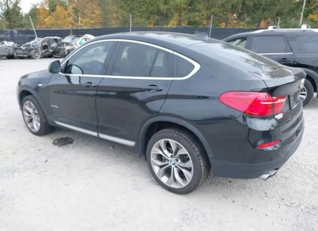 Photo 2 VIN: 5UXXW3C53J0T82336 - BMW X4 