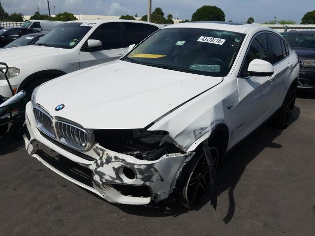 Photo 1 VIN: 5UXXW3C55G0R22584 - BMW X4 