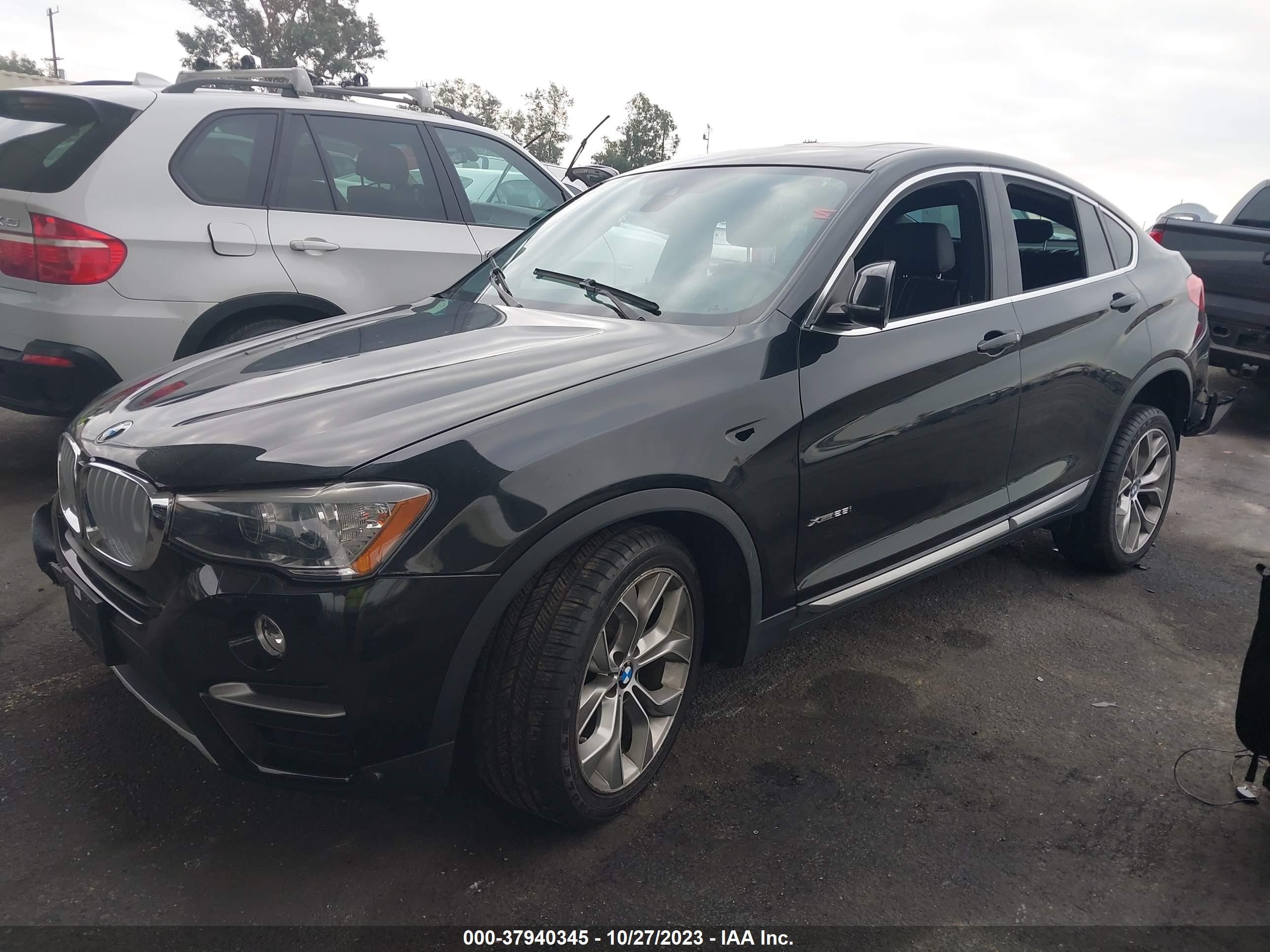 Photo 1 VIN: 5UXXW3C55J0T81785 - BMW X4 