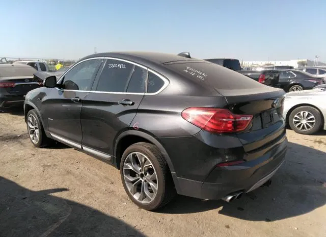 Photo 2 VIN: 5UXXW3C57F0M89106 - BMW X4 