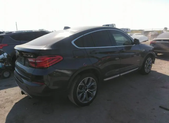 Photo 3 VIN: 5UXXW3C57F0M89106 - BMW X4 