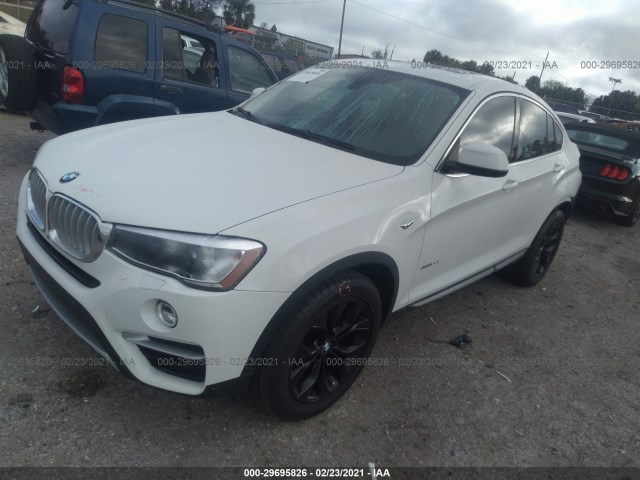 Photo 1 VIN: 5UXXW3C57G0R19265 - BMW X4 