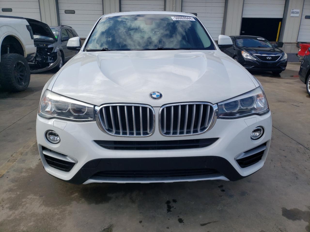 Photo 4 VIN: 5UXXW3C58G0R18951 - BMW X4 