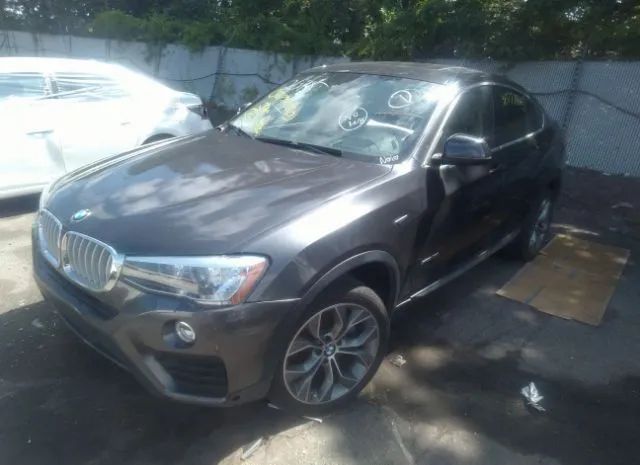 Photo 1 VIN: 5UXXW3C59F0M87129 - BMW X4 