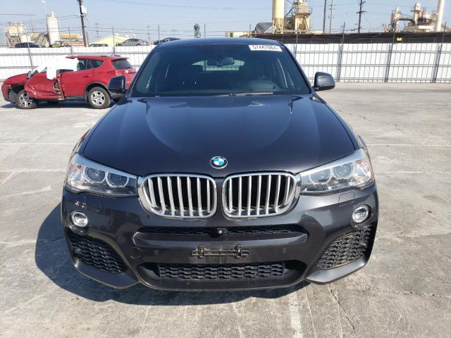 Photo 4 VIN: 5UXXW5C50G0N91702 - BMW X4 