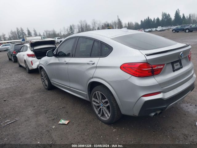 Photo 2 VIN: 5UXXW5C58G0N91799 - BMW X4 