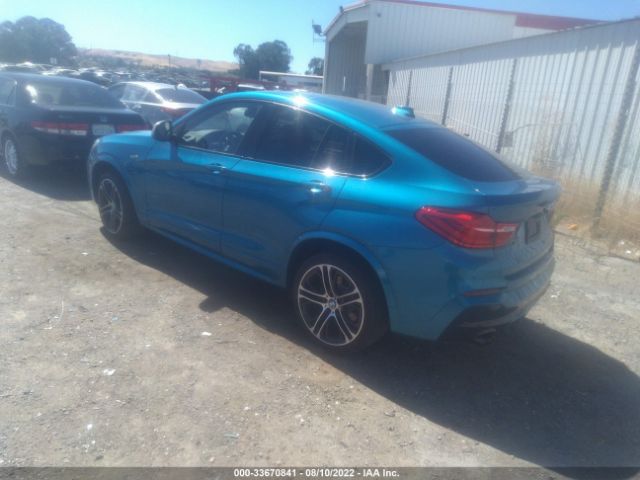 Photo 2 VIN: 5UXXW7C50G0M91031 - BMW X4 