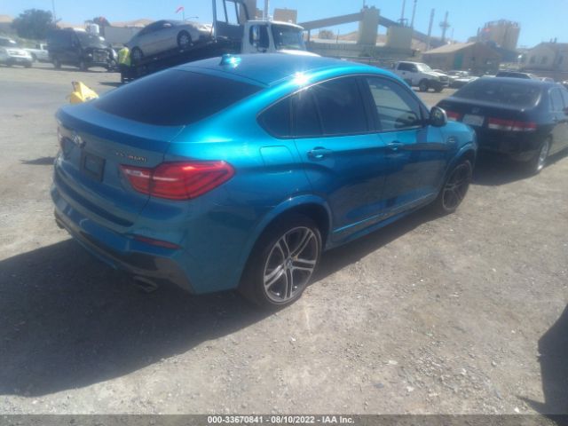 Photo 3 VIN: 5UXXW7C50G0M91031 - BMW X4 