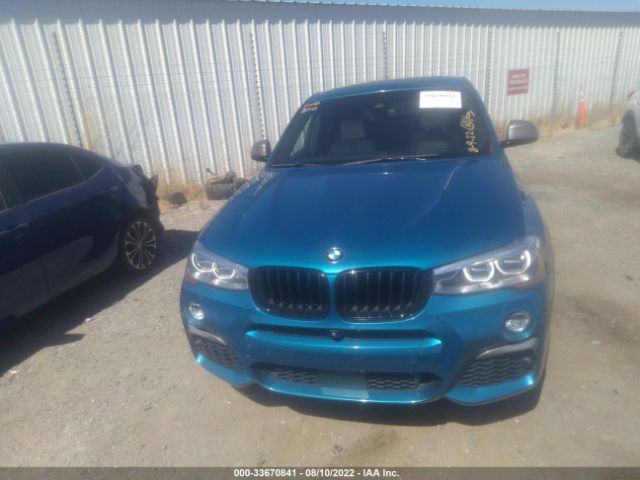 Photo 5 VIN: 5UXXW7C50G0M91031 - BMW X4 