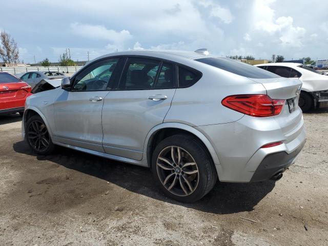 Photo 1 VIN: 5UXXW7C56J0W65028 - BMW X4 XDRIVEM 