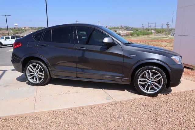 Photo 2 VIN: 5UXXW7C56J0Z44849 - BMW X4 