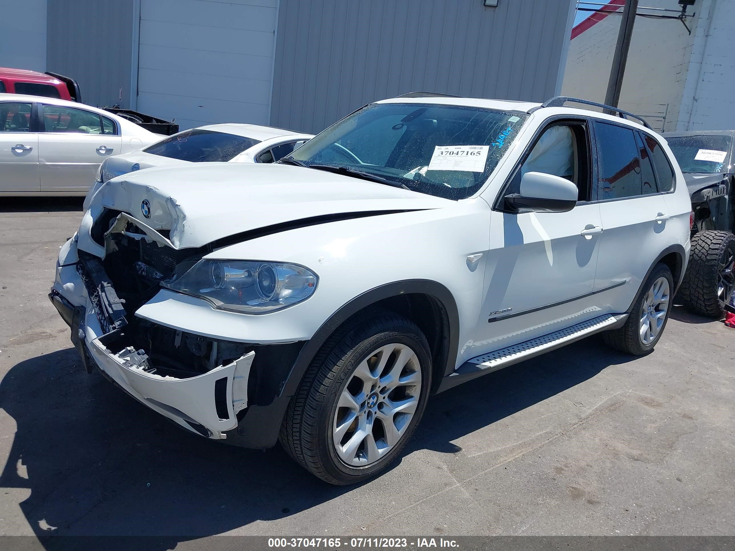 Photo 1 VIN: 5UXZV4C57CL890179 - BMW X5 