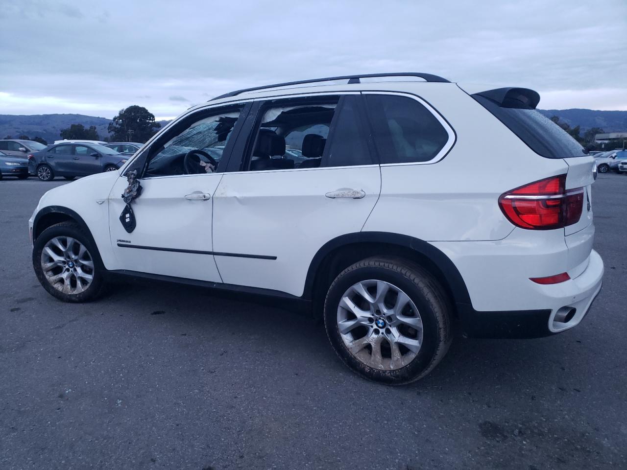 Photo 1 VIN: 5UXZV4C59D0G57037 - BMW X5 