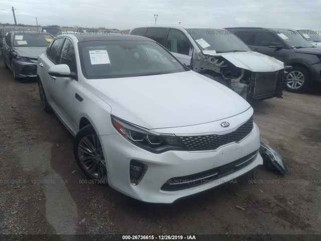 Photo 0 VIN: 5XXGV4L2XJG214157 - KIA OPTIMA 