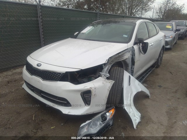 Photo 1 VIN: 5XXGV4L2XJG214157 - KIA OPTIMA 