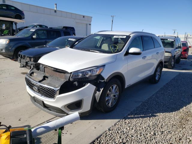 Photo 1 VIN: 5XYPGDA5XGG137740 - KIA SORENTO LX 