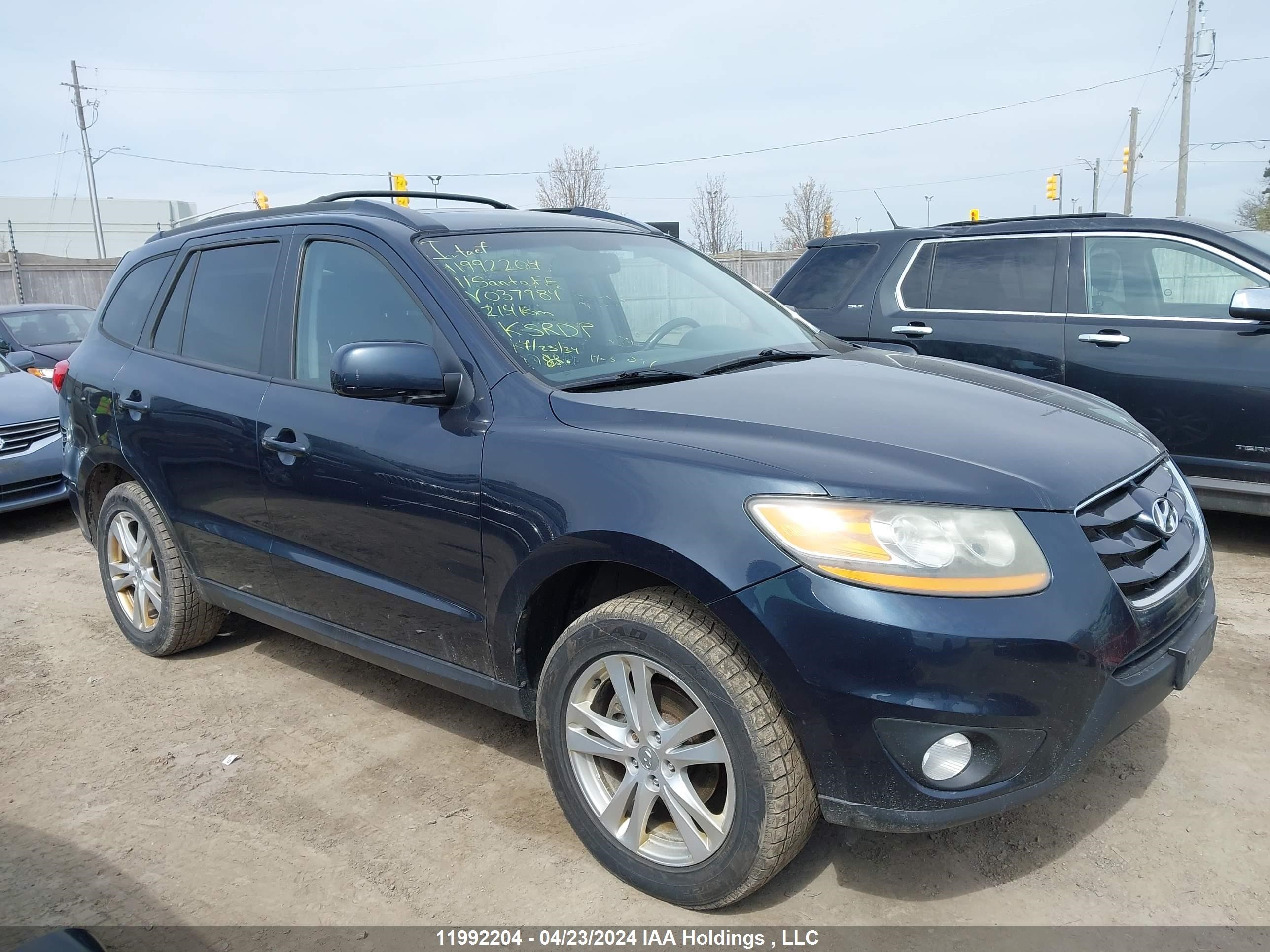 Photo 12 VIN: 5XYZG4AG5BG037984 - HYUNDAI SANTA FE 