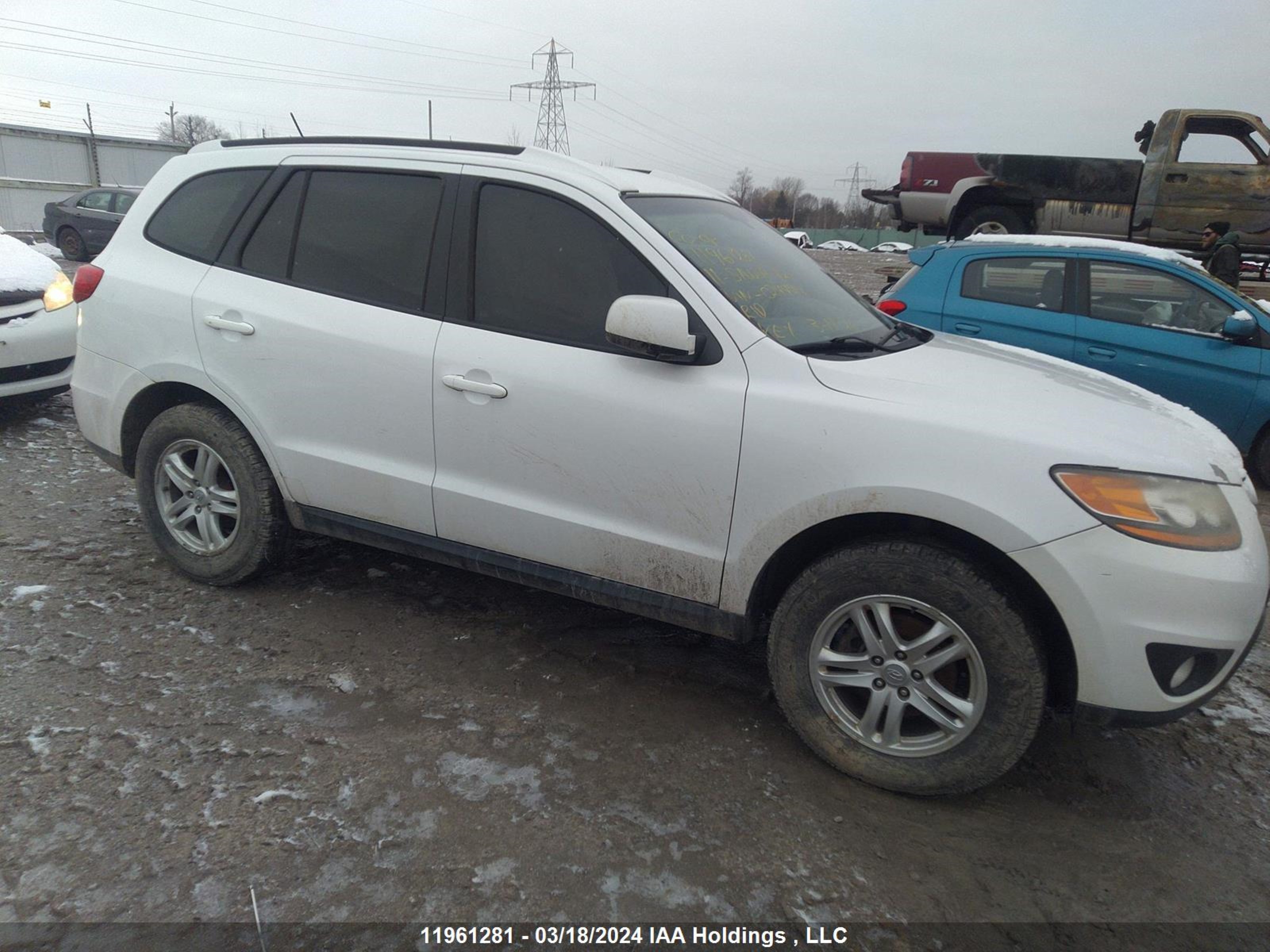 Photo 12 VIN: 5XYZG4AG7BG024444 - HYUNDAI SANTA FE 