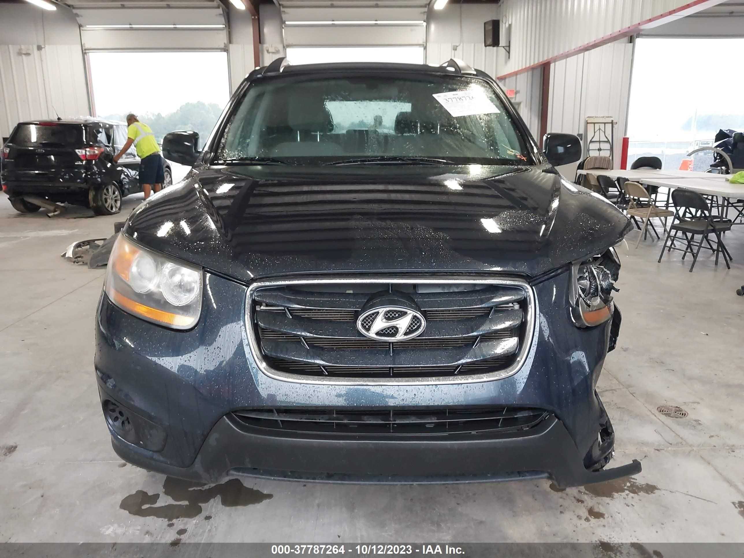 Photo 11 VIN: 5XYZGDAB4BG016421 - HYUNDAI SANTA FE 