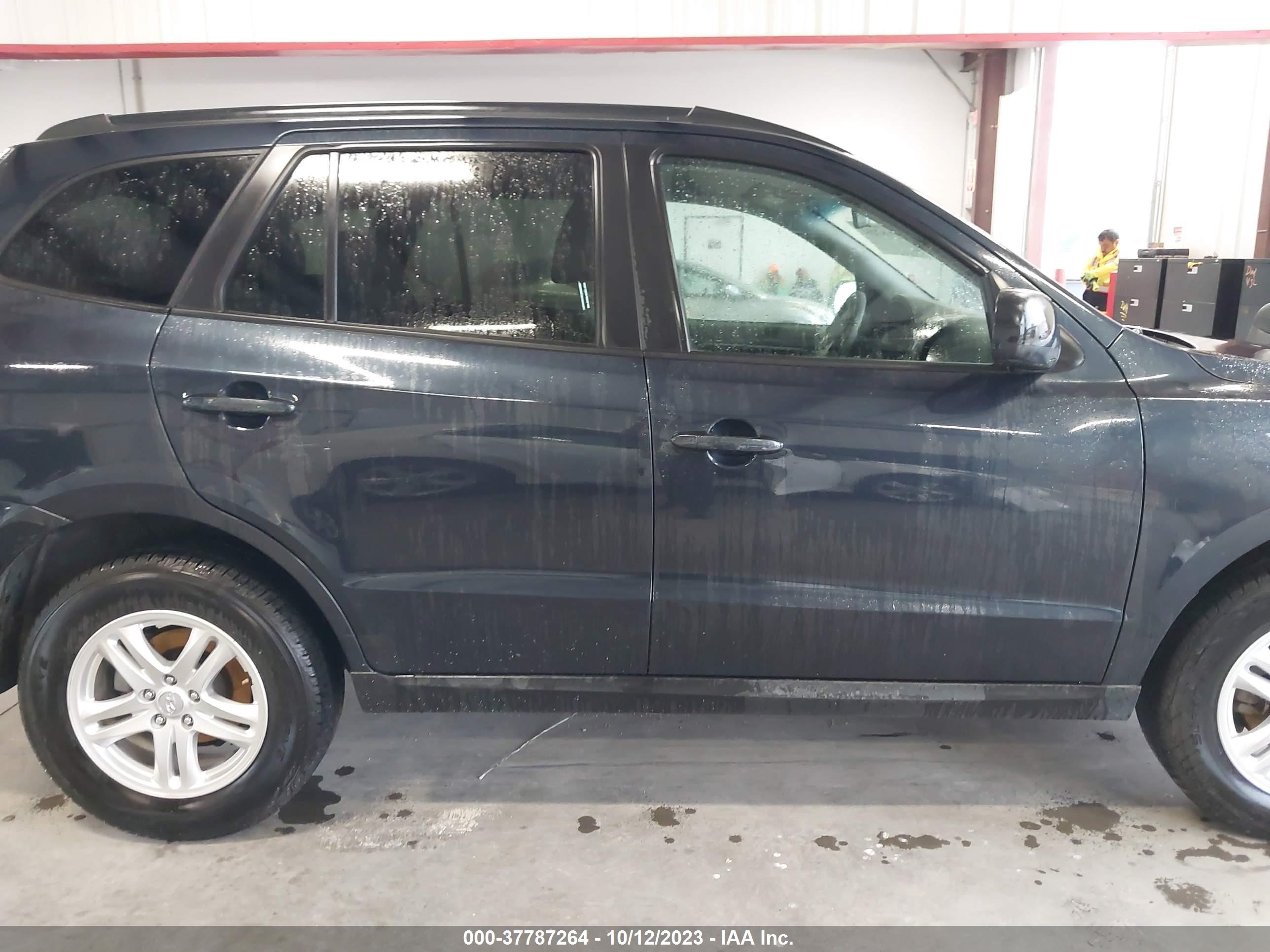 Photo 12 VIN: 5XYZGDAB4BG016421 - HYUNDAI SANTA FE 