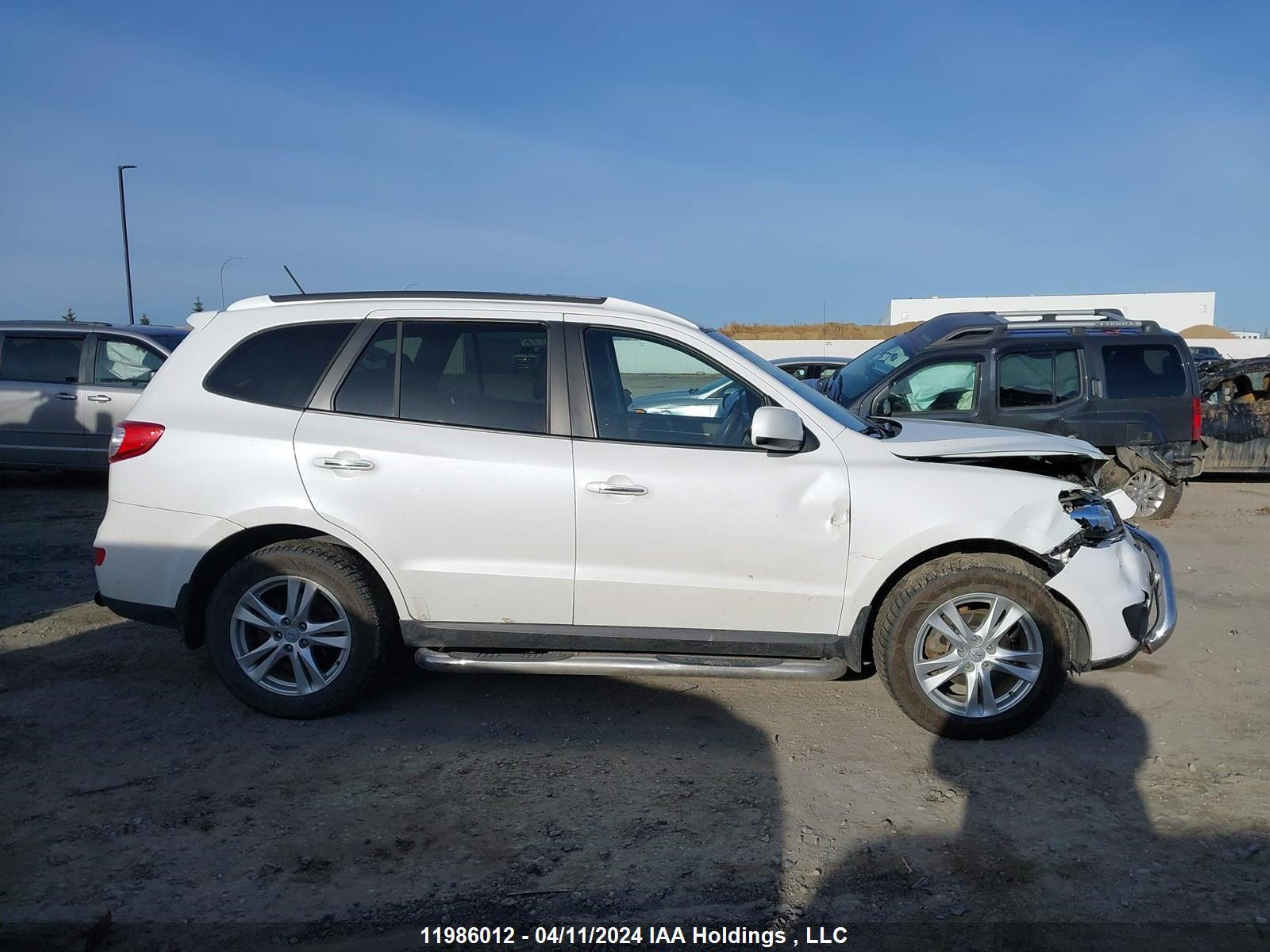 Photo 12 VIN: 5XYZHDAG8BG037913 - HYUNDAI SANTA FE 