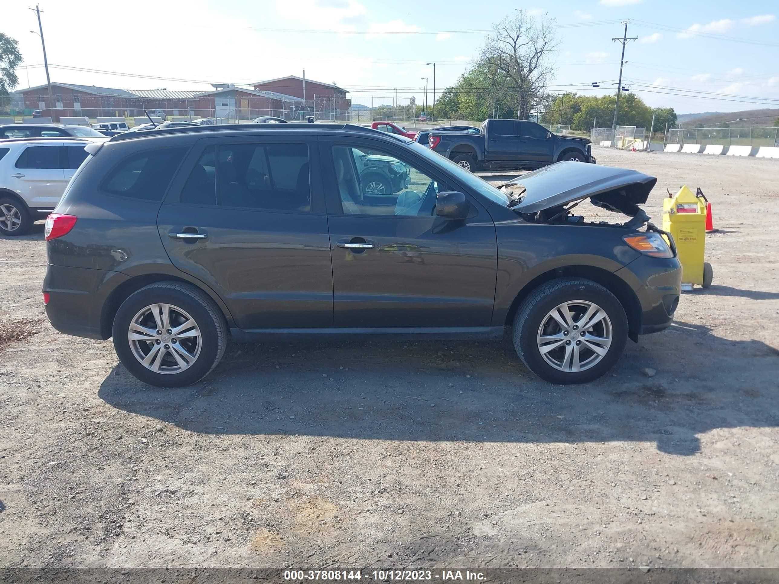 Photo 12 VIN: 5XYZK4AG8BG082433 - HYUNDAI SANTA FE 