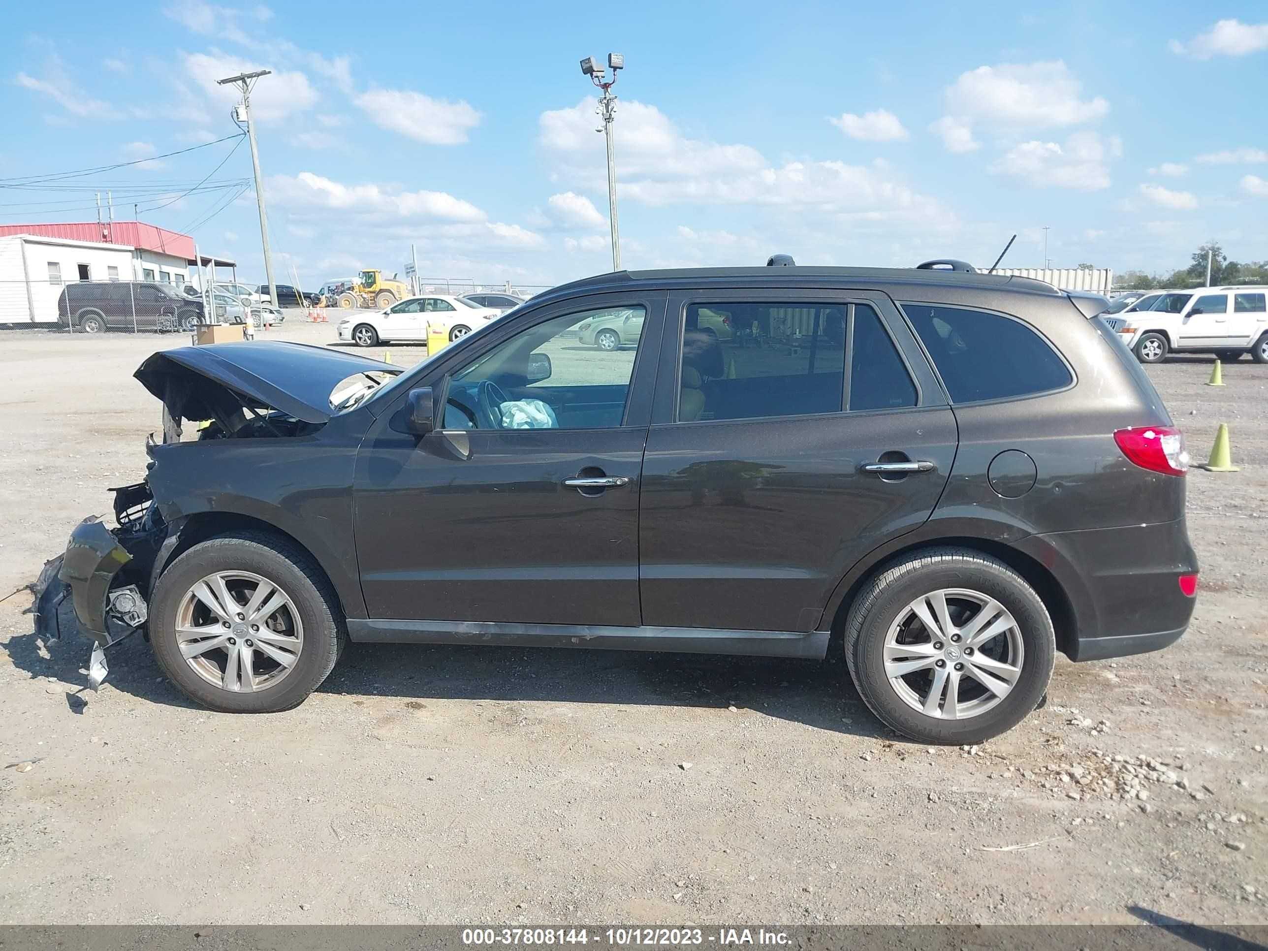 Photo 13 VIN: 5XYZK4AG8BG082433 - HYUNDAI SANTA FE 