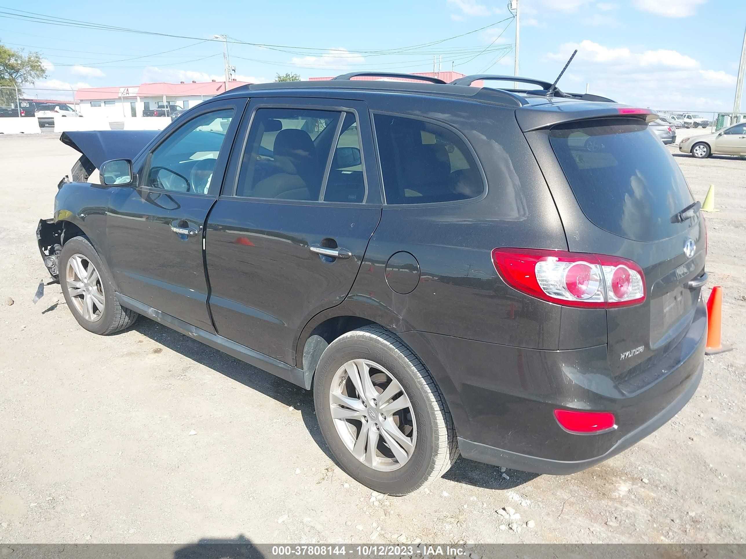 Photo 2 VIN: 5XYZK4AG8BG082433 - HYUNDAI SANTA FE 