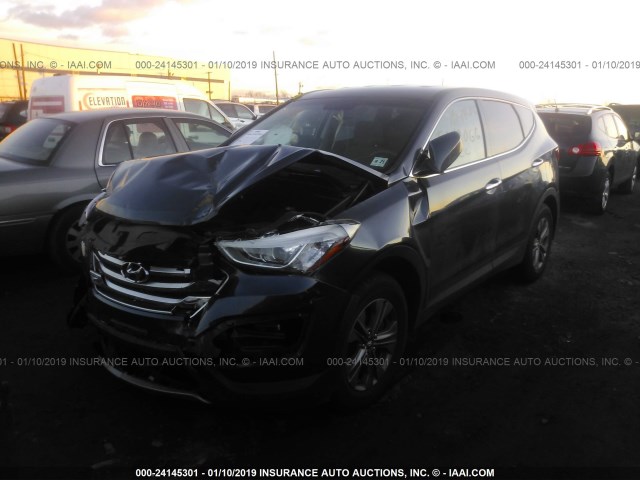 Photo 1 VIN: 5XYZT3LB1GG350061 - HYUNDAI SANTA FE SPORT 