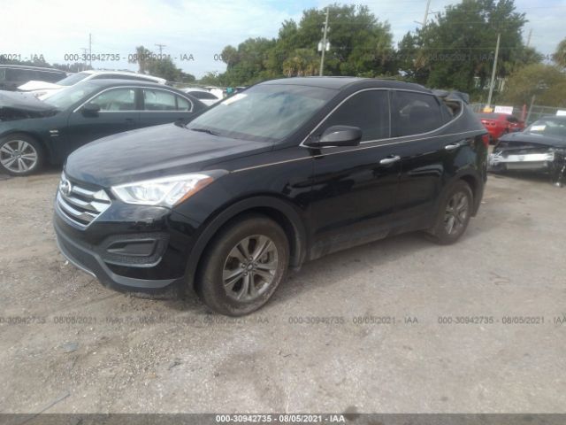 Photo 1 VIN: 5XYZT3LB4GG359529 - HYUNDAI SANTA FE SPORT 