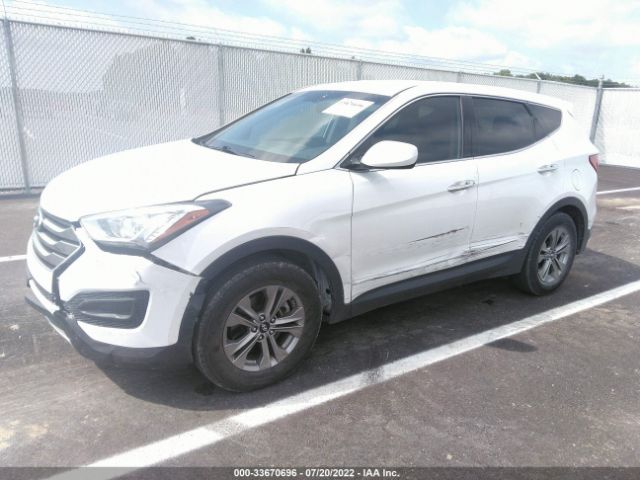 Photo 1 VIN: 5XYZT3LB5GG372130 - HYUNDAI SANTA FE SPORT 