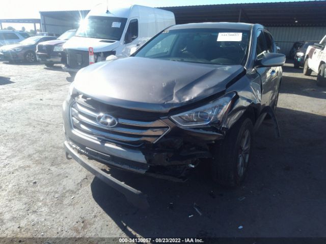 Photo 5 VIN: 5XYZTDLB2FG299111 - HYUNDAI SANTA FE SPORT 