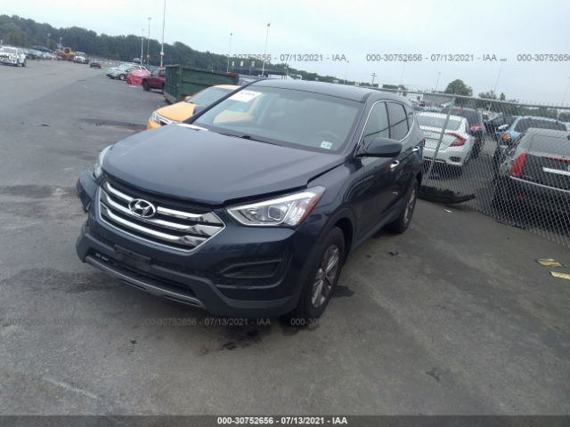 Photo 1 VIN: 5XYZTDLB6GG349509 - HYUNDAI SANTA FE SPORT 