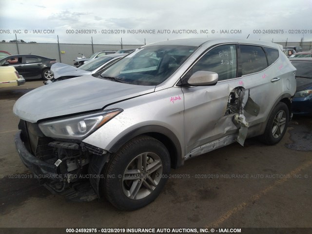 Photo 1 VIN: 5XYZTDLB9JG557374 - HYUNDAI SANTA FE SPORT 