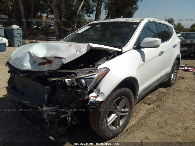 Photo 1 VIN: 5XYZTDLB9JG557925 - HYUNDAI SANTA FE SPORT 